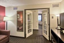 Traverse Blossom hotel King Junior Suite room french doors leading to bedroom